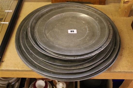 Quantity of pewter chargers